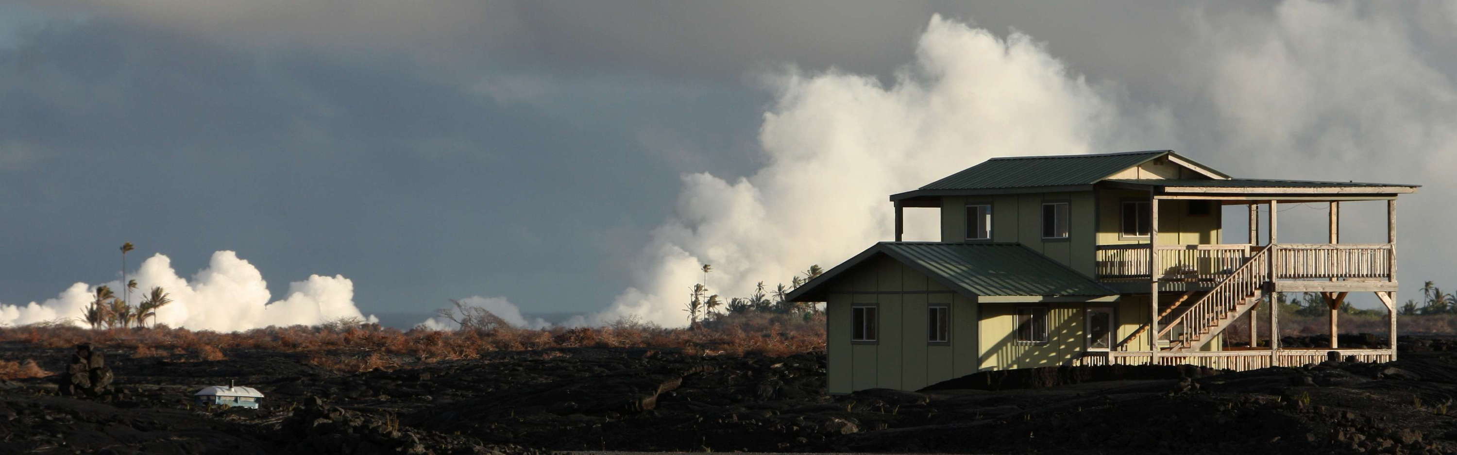 Kalapana  |  Homes on lava and steam plume