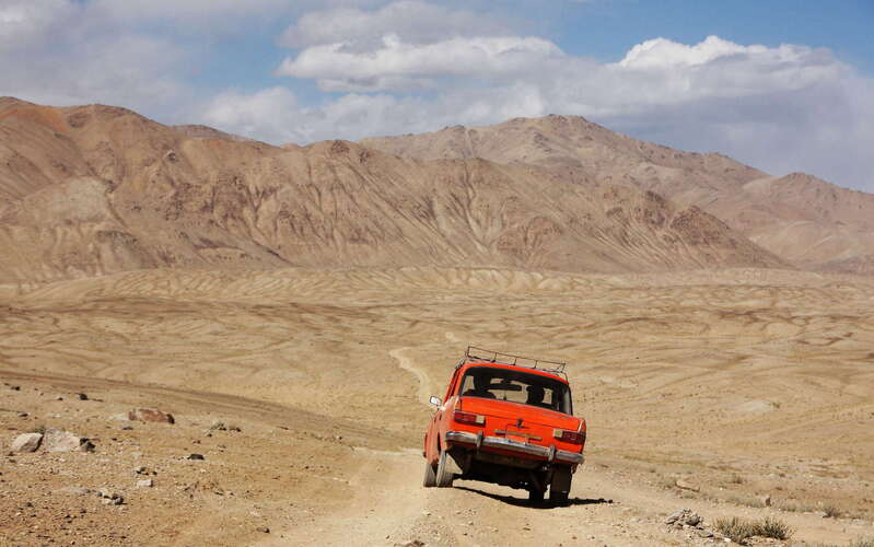 Alichur Pamir  |  Small car on dirt road