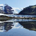 Svínafellsjökull reflecting in proglacial lake