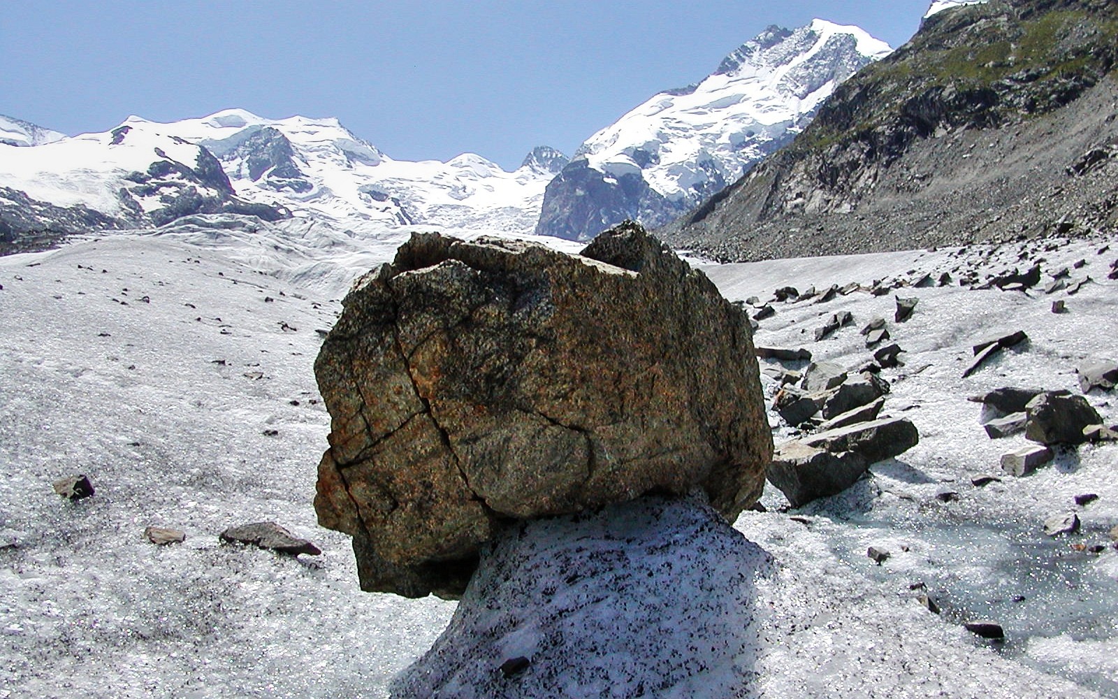 Morteratschgletscher  |  Ice sheltered by rock